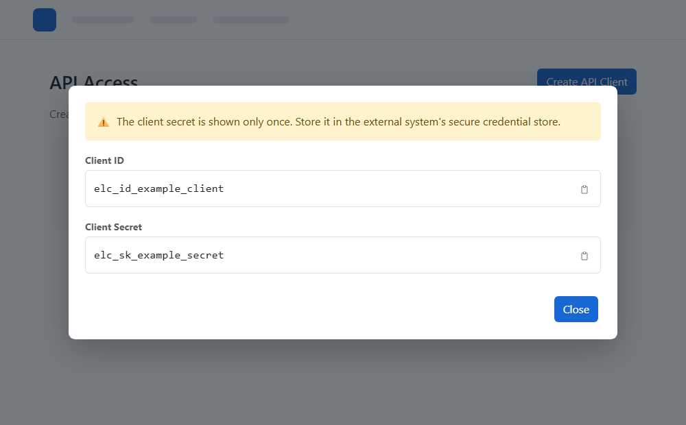 One-time API credentials dialog with non-production example values